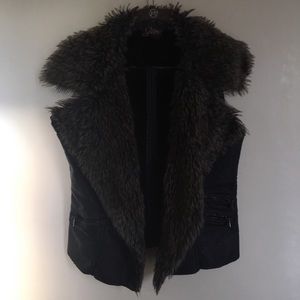 Black Faux leather vest with faux fur.